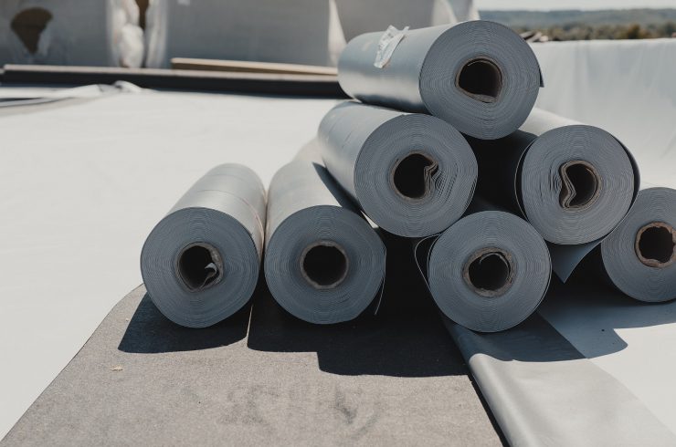 Roofing,Pvc,Membrane,In,Rolls,Placed,On,The,Roof,Of